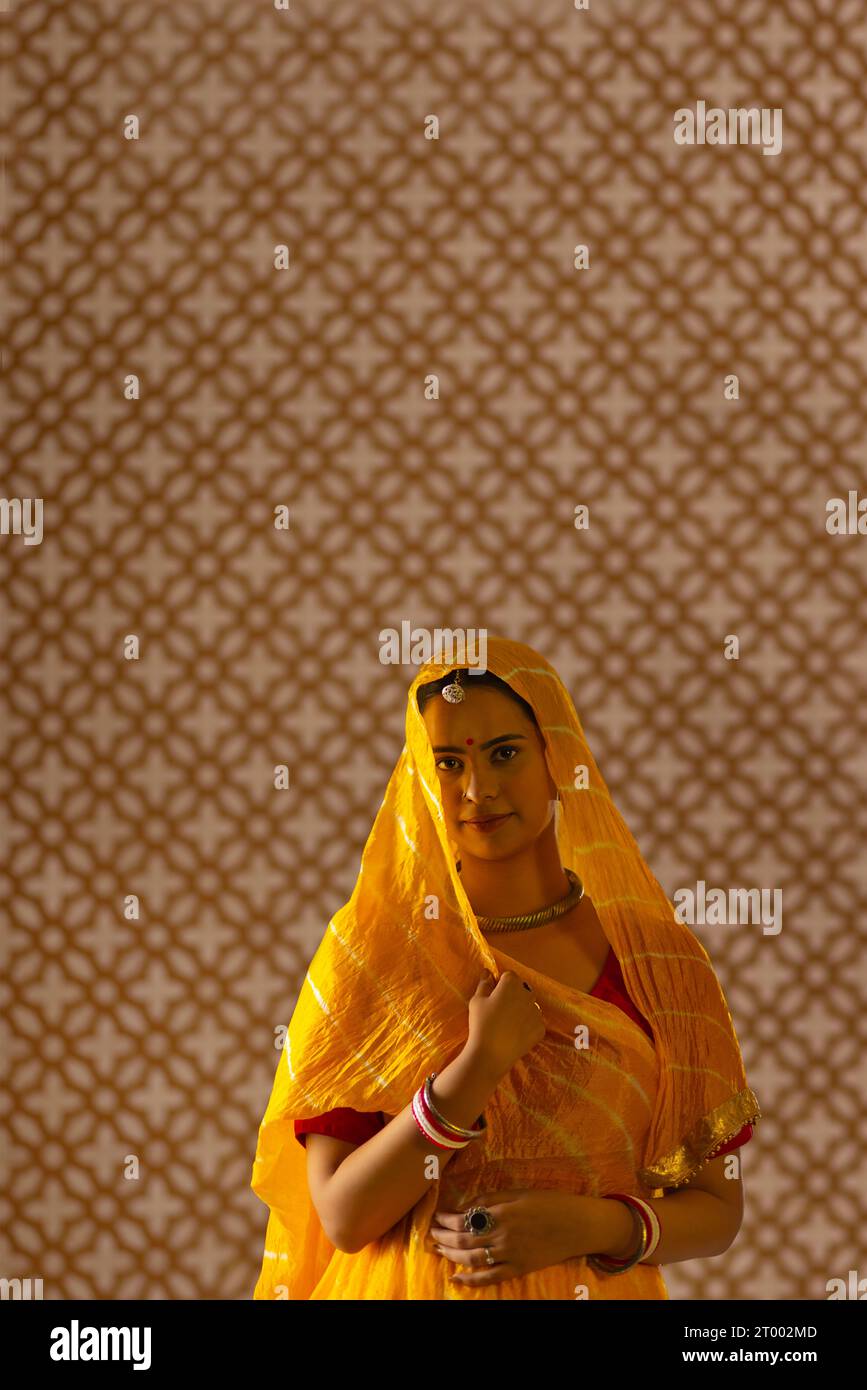 Portrait of Rajasthani young woman standing Stock Photo