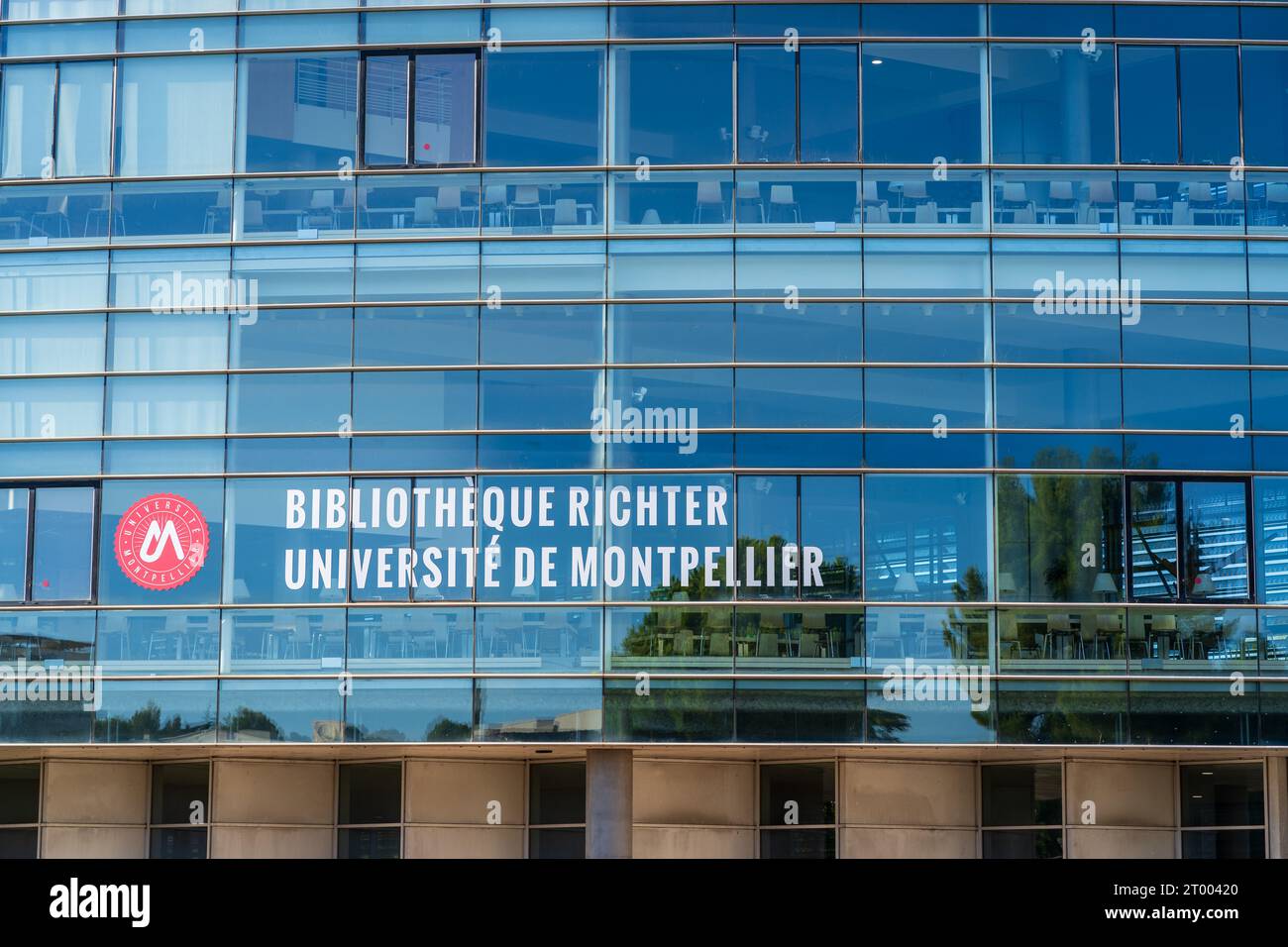 Montpellier, France - 09 30 2023 : Closeup view of the glass facade of Richter university library, modern architecture by René Dottelonde Stock Photo
