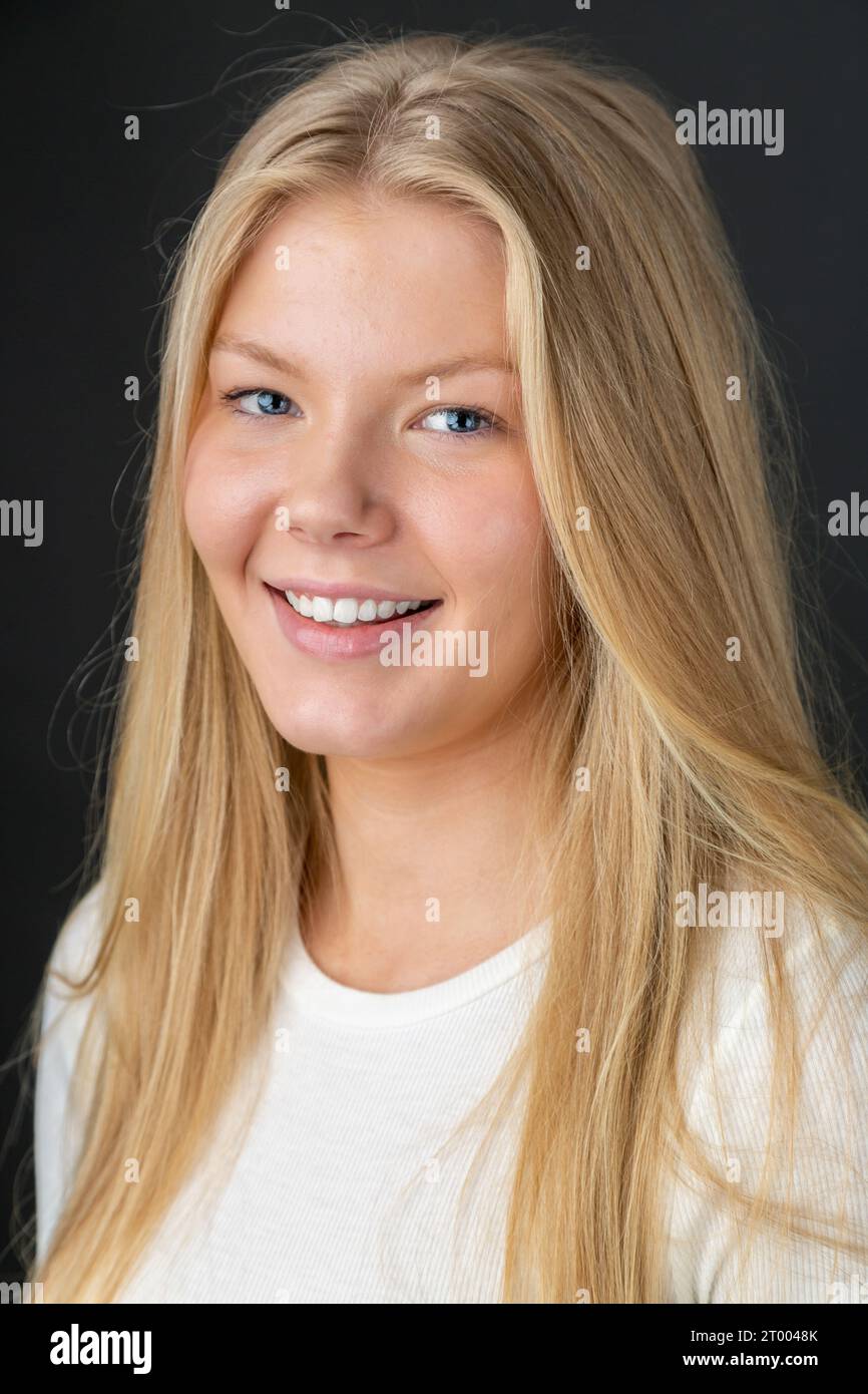 Beauty portrait of a young 18 year old woman with long blonde hair Stock Photo