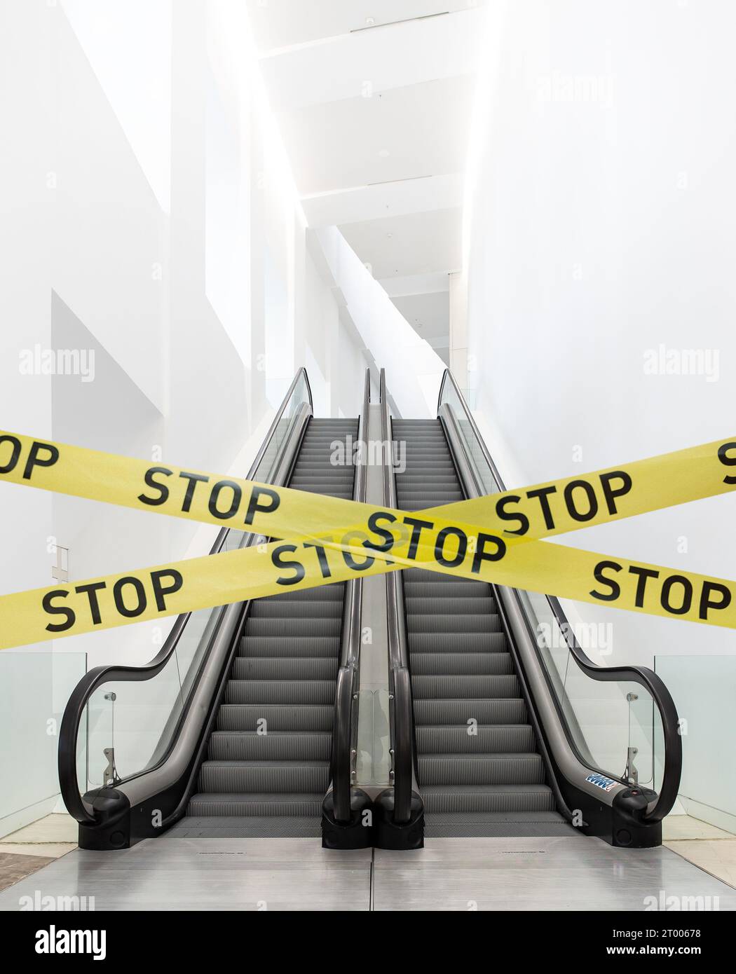 Closed barrier tape on mechanic stairs of a building Stock Photo