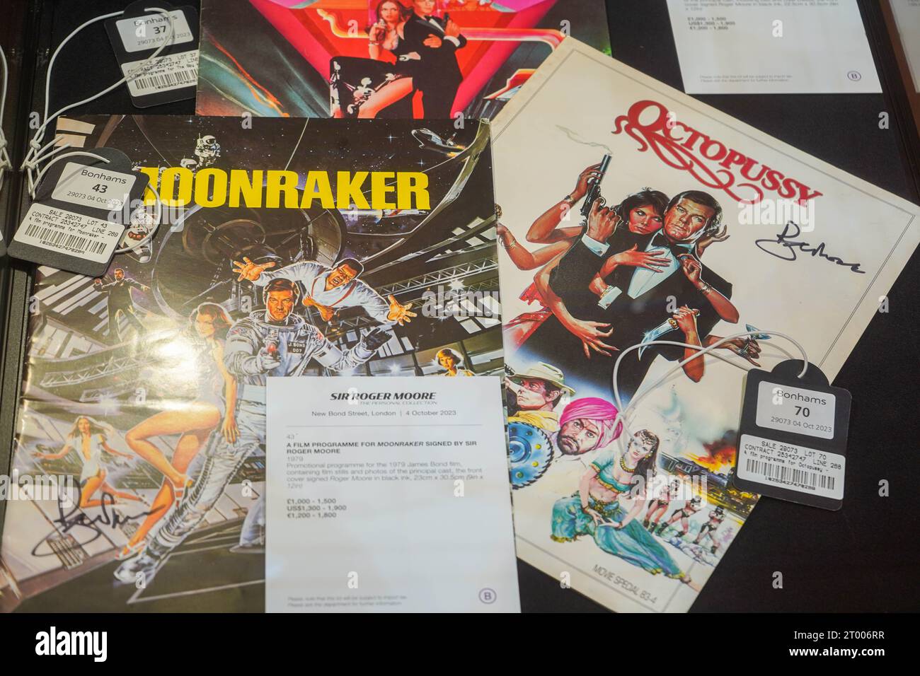 A film programme for Moonraker and Octopussy signed by Sir Roger Moore Stock Photo