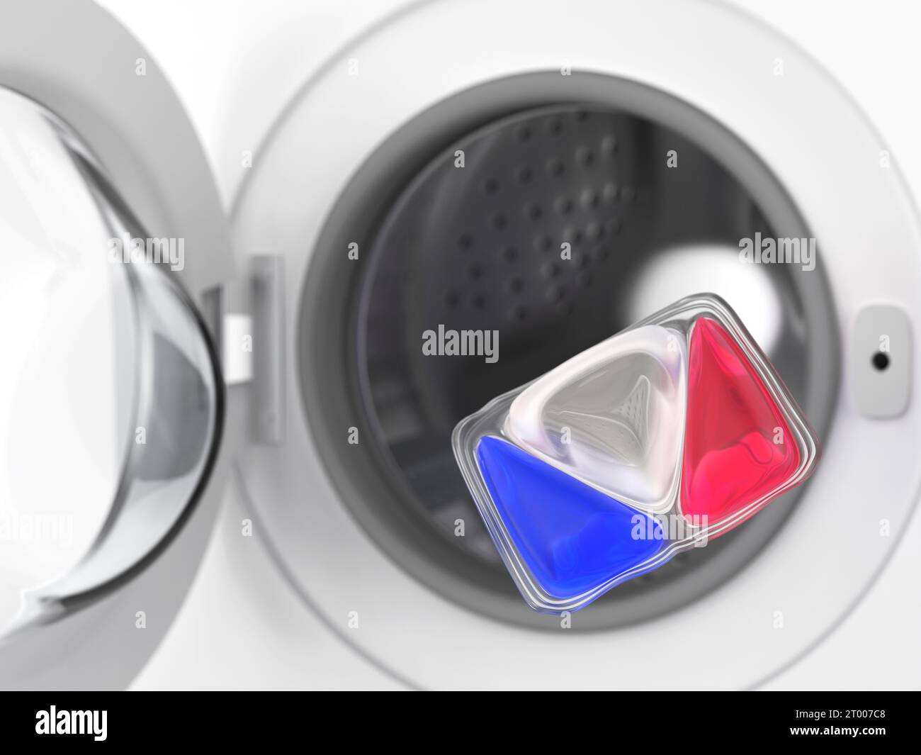 Laundry detergent pod in front of washing machine Stock Photo Alamy