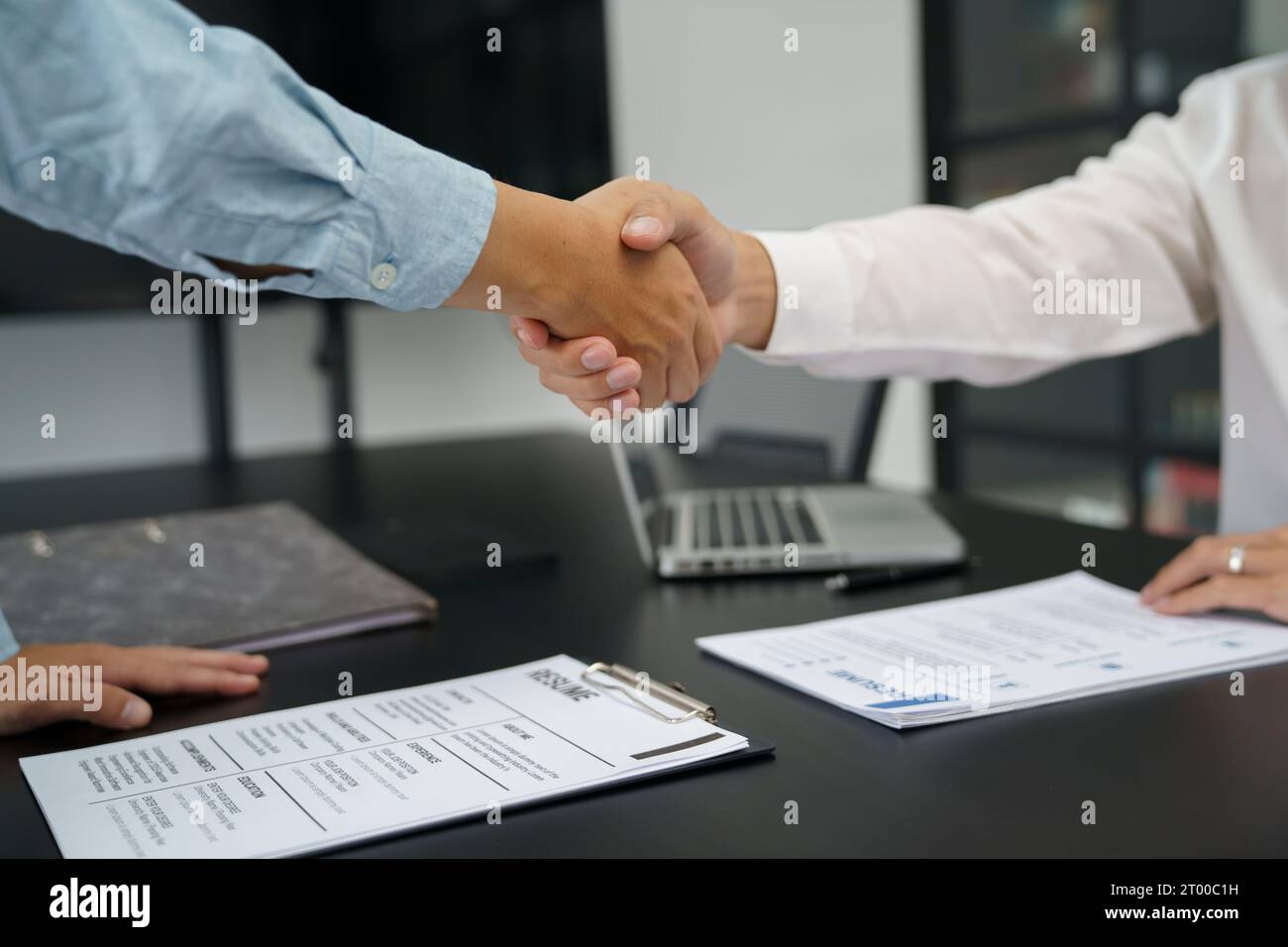 Businessman shaking hands successful candidate at interview. got the job in the team. Welcome aboard successful making a deal. p Stock Photo