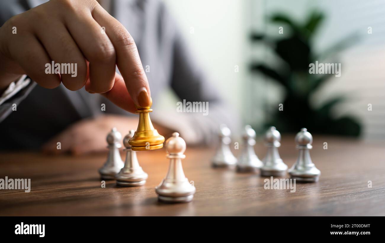 Human resources concept career management with clasped hands planning strategy with chess figures. HR department Search for empl Stock Photo