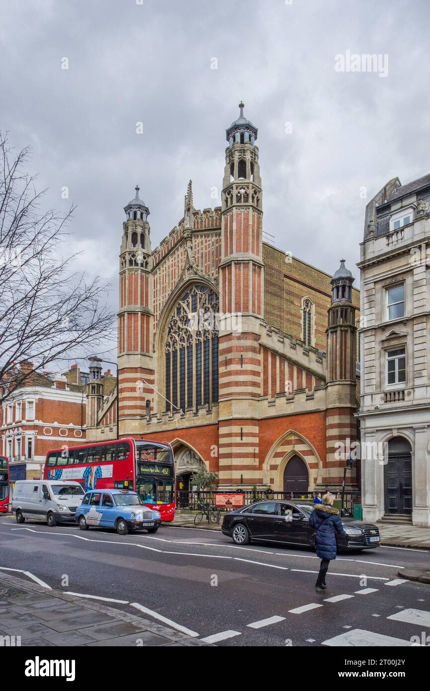 Holy Trinity church viewed from Sloane Street, London; built 1890 in the Arts and Crafts style by the architect John Dando Sedding. Stock Photo