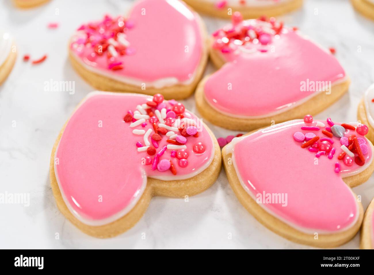 Heartshaped sugar cookies with royal icing Stock Photo Alamy