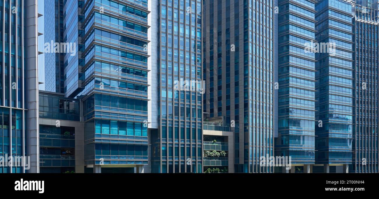 Modern office skyscrapers ,high rise buildings with glass facades, Concepts of finances and economics background. Stock Photo