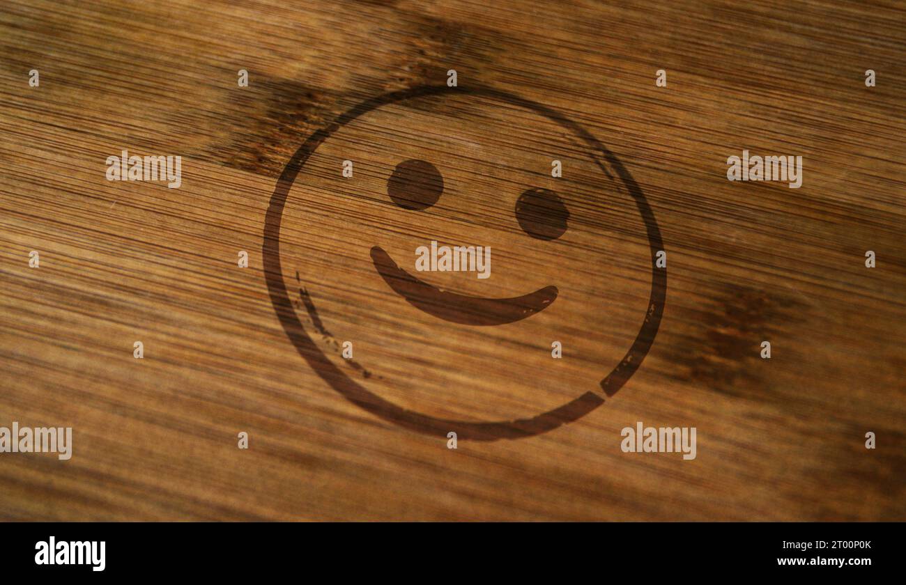 Smiley emoticon icon symbol stamp printed on wooden box. Smile emoji ...