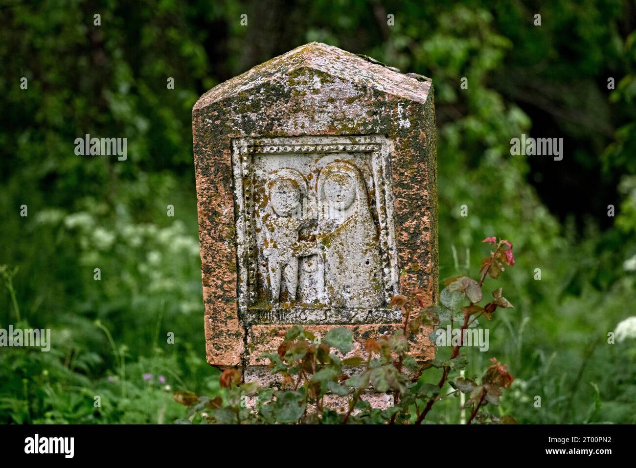 Christian stele in the woods near the village of Pagani. Campofontana, Selva di Progno, Lessinia, Veneto, Italy. Stock Photo