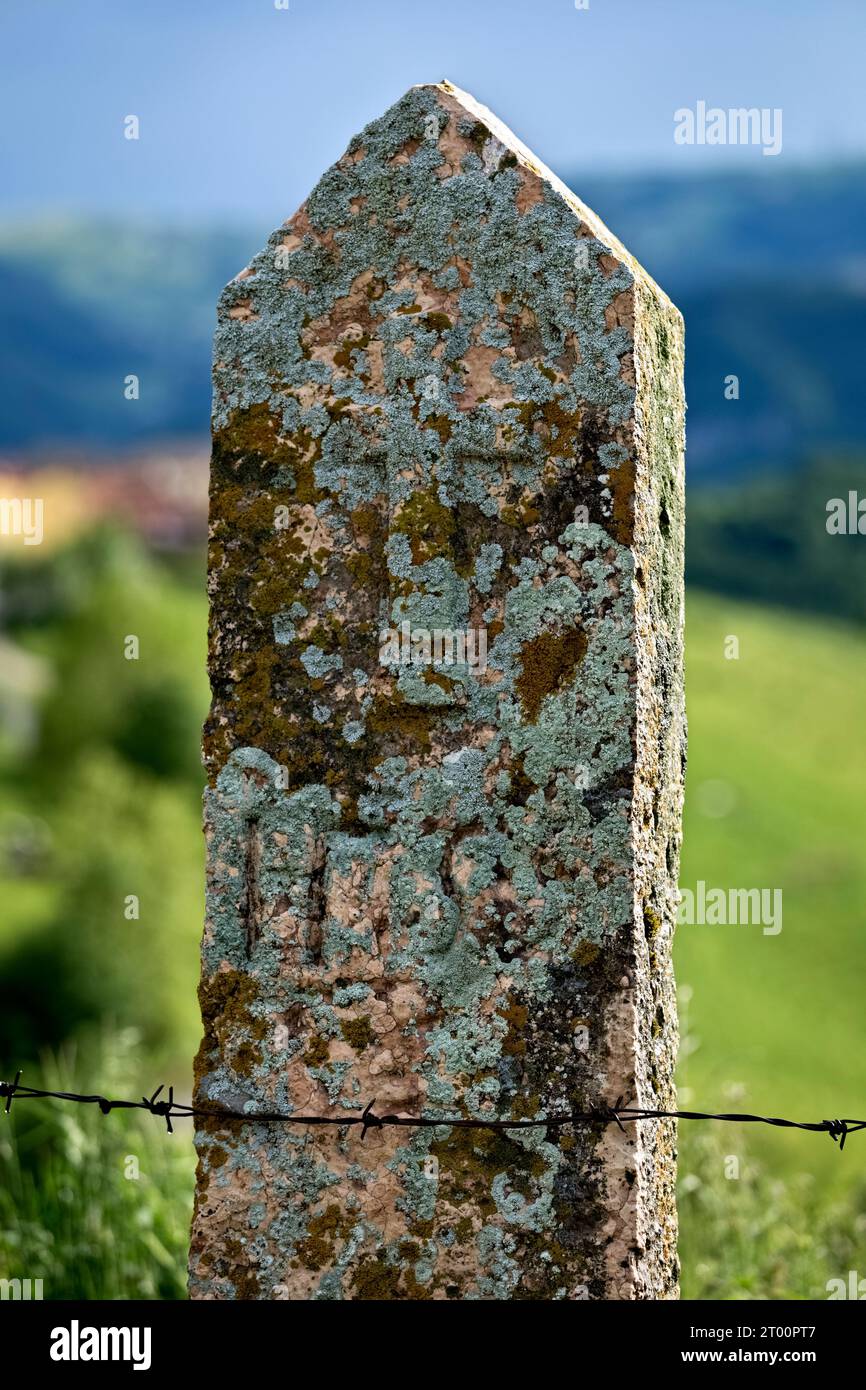 Stele depicting a Christian cross near the village of Pagani. Campofontana, Selva di Progno, Lessinia, Veneto, Italy. Stock Photo