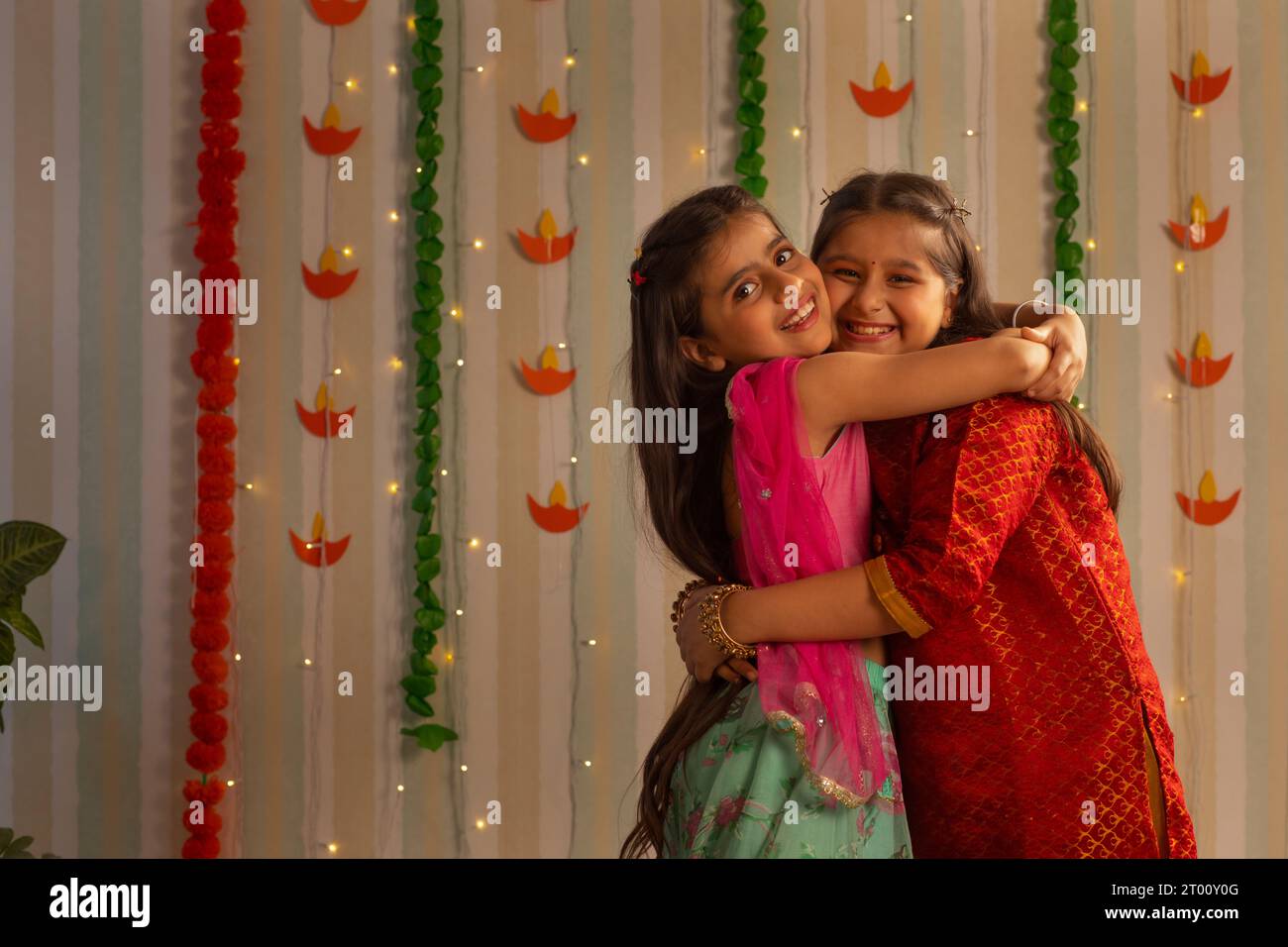 Two little girls embracing each other on the occasion of Diwali Stock ...