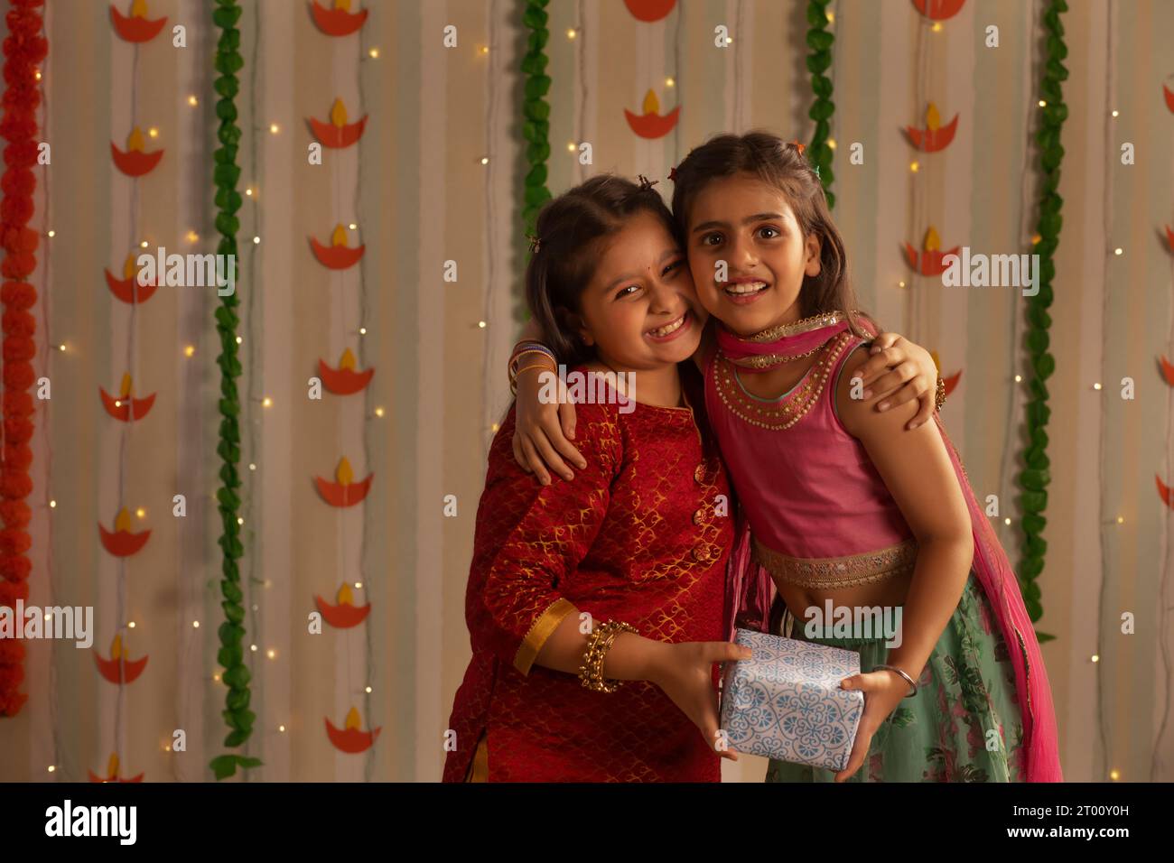 Two little girls embracing each other on the occasion of Diwali Stock ...