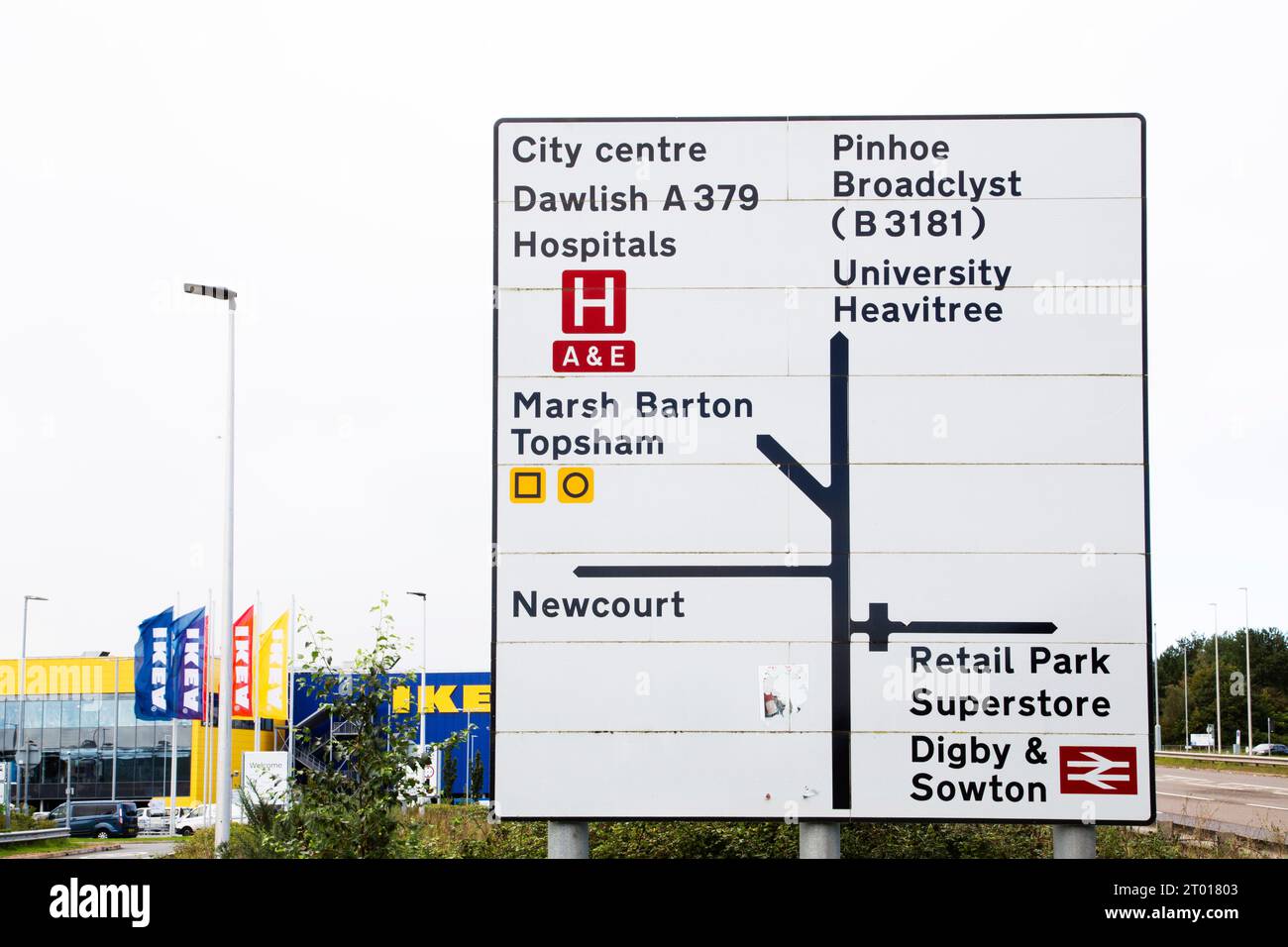 close-up of large road sign on A379 Exeter highlighting City centre, Dawlish, Hospitals, Marsh Barton, Topsham, Newcourt, Pinhoe, Broadclyst B3181 Stock Photo