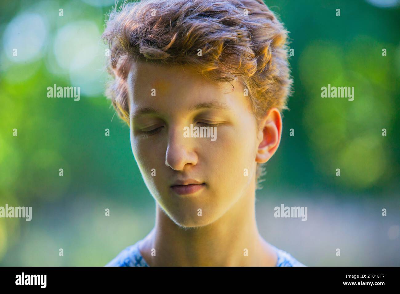 Outdoor portrait of a teenage boy Stock Photo - Alamy