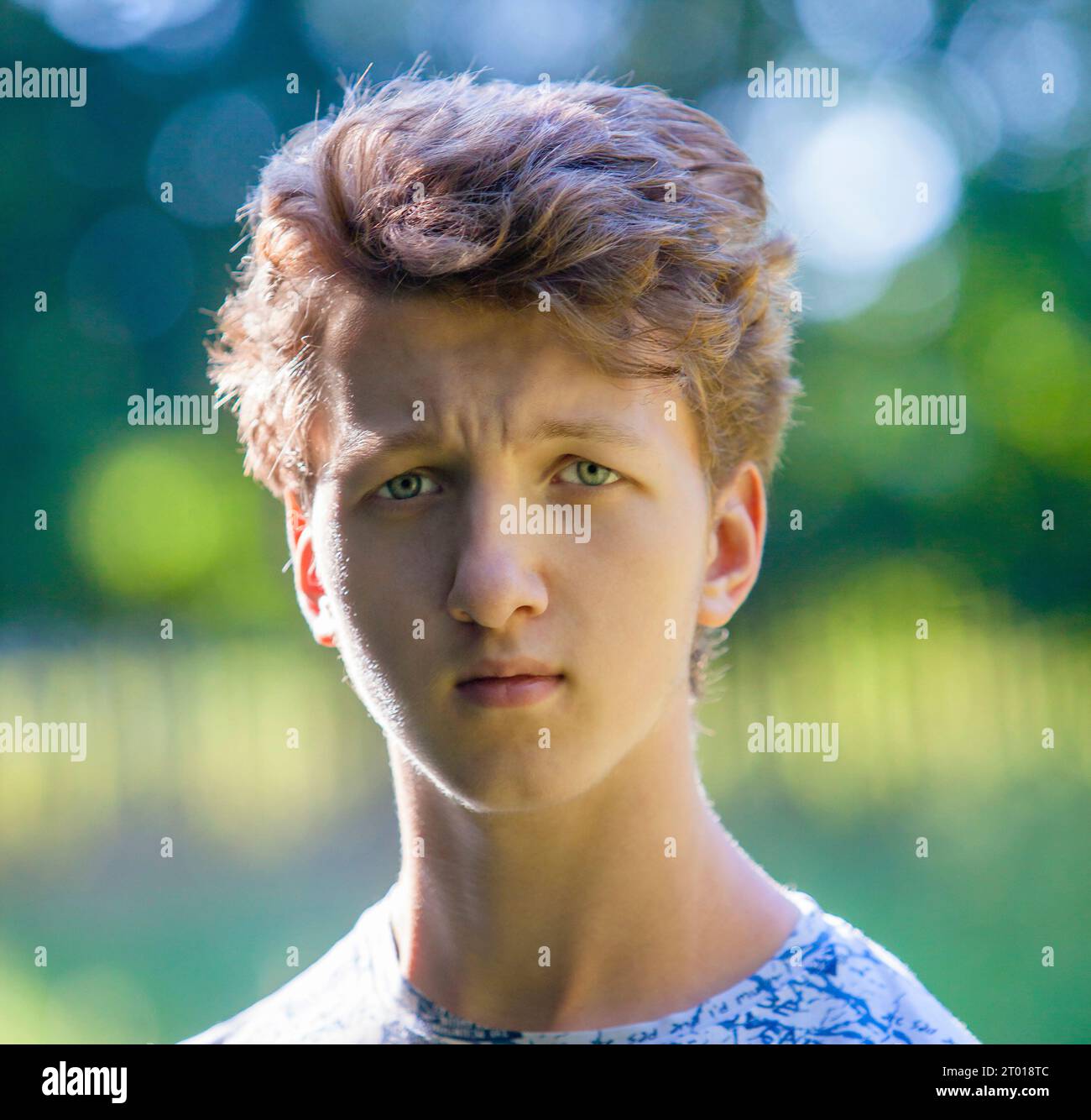 Outdoor portrait of a teenage boy Stock Photo - Alamy