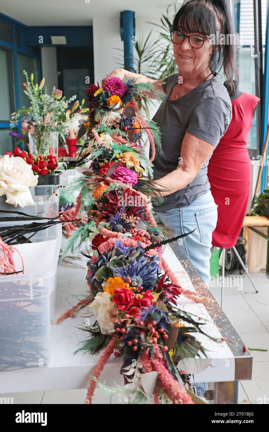 Magdeburg, Germany. 03rd Oct, 2023. Andrea Knutas from "Floralwerk" in