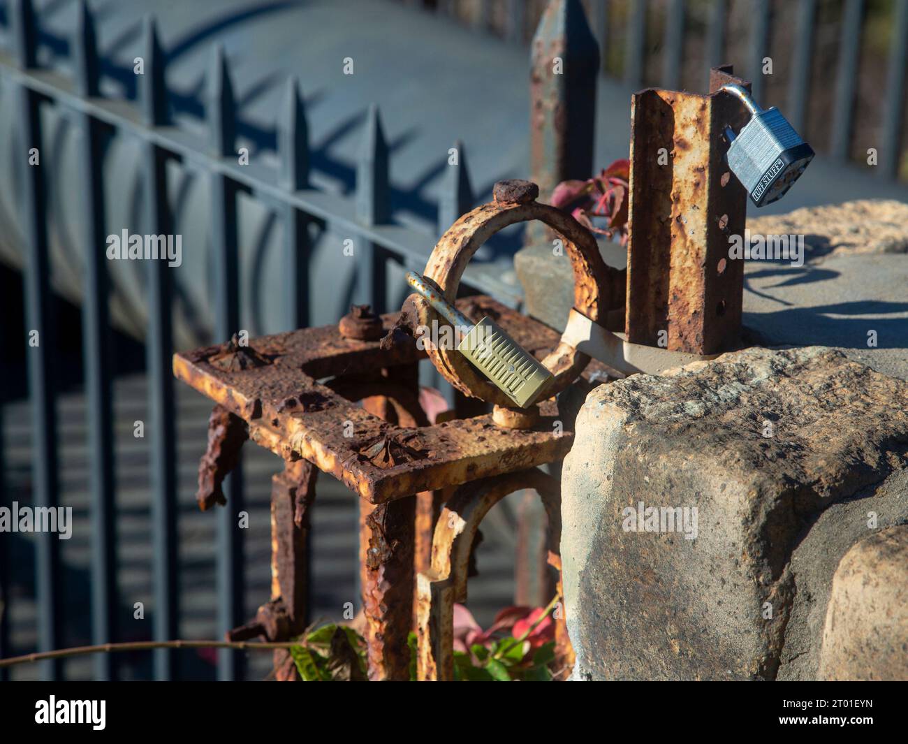 A lock on a rusty fence Stock Photo