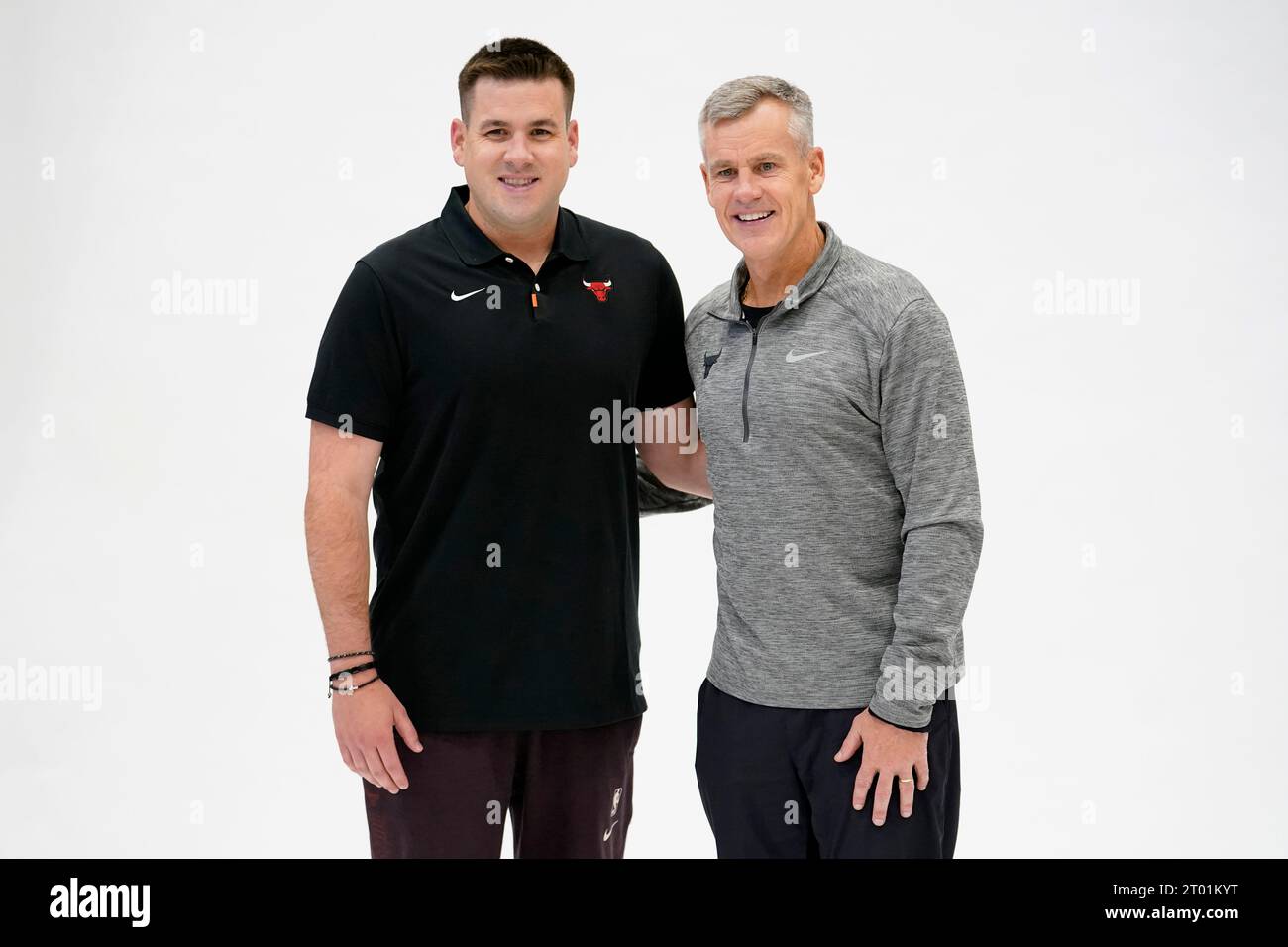 Chicago Bulls Senior Video Coordinator Billy Donovan III, left, poses