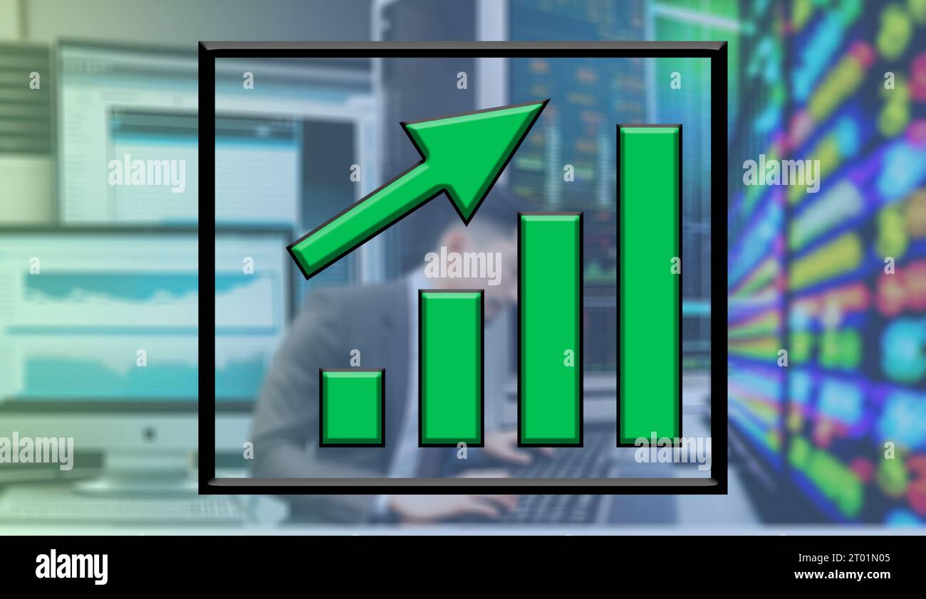 man working on computers stock market with green upward graph Stock ...