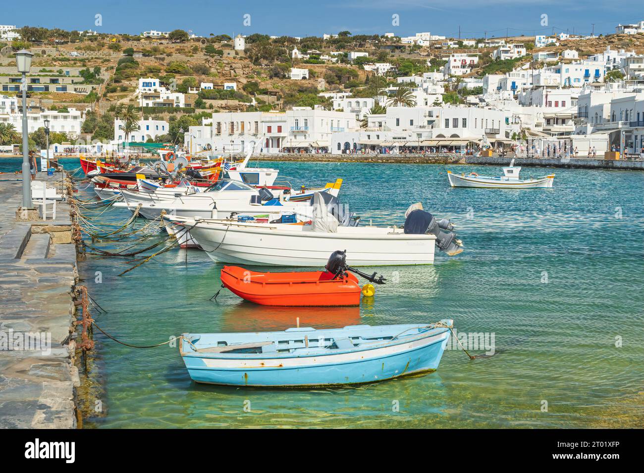 Small boast in the Bay of Mykonos Town Stock Photo