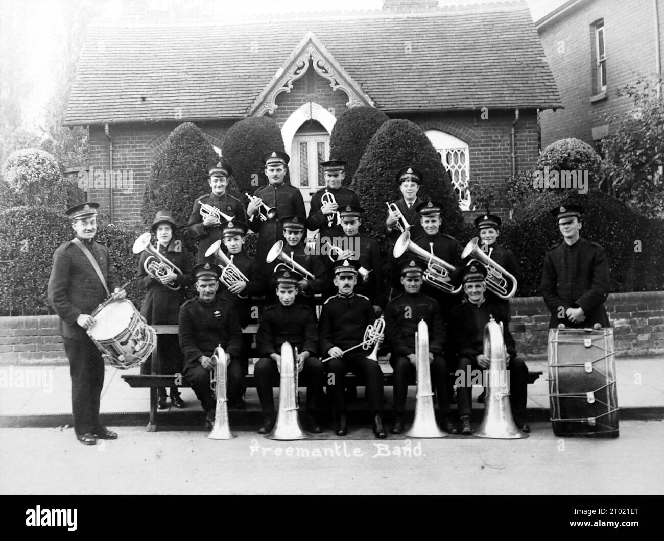 A Salvation Army brass band from Freemantle, Southampton, England, c1920s. From an original photograph of approximately 8x6 inches, which is both undated and unattributed. The photograph shows band members with instruments outside a hut (possibly a Salvation Army hut). Stock Photo