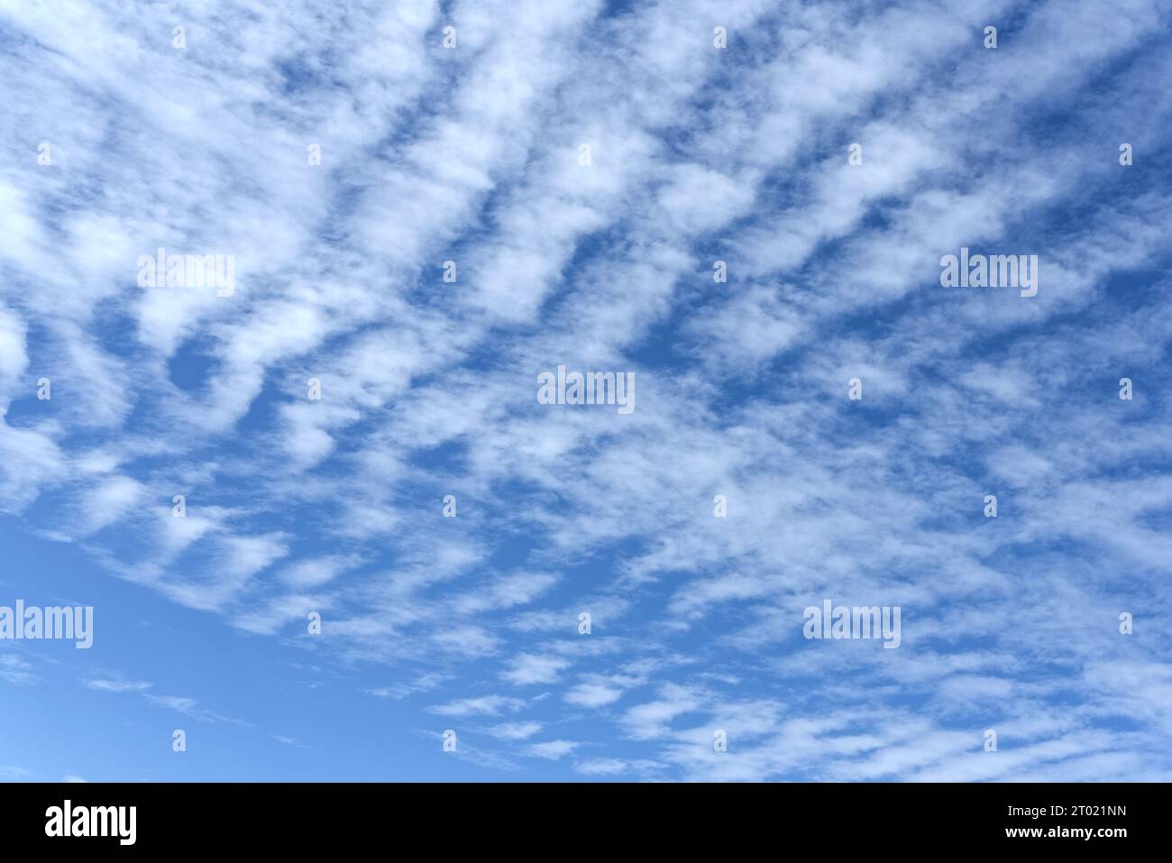 Altocumulus undulatus clouds forming a ripple effect pattern Stock Photo
