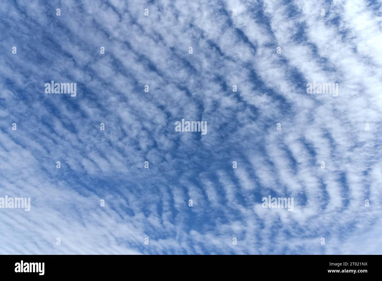 Altocumulus undulatus clouds forming a ripple effect pattern Stock Photo