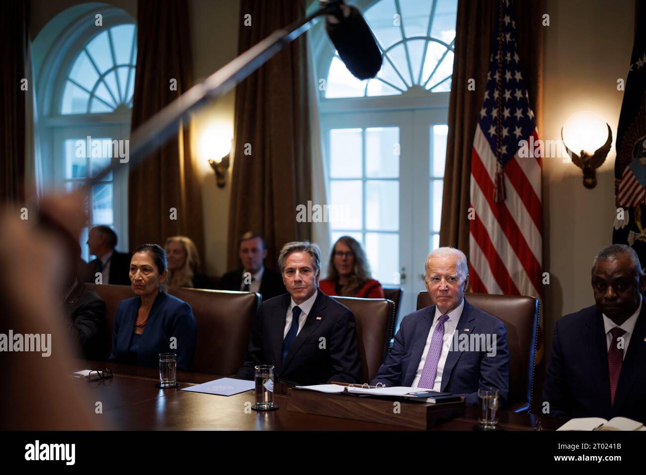 Pictured from left to right: United States Secretary of the Interior Debra Haaland, US Secretary of State Antony Blinken, US President Joe Biden, and US Secretary of Defense Lloyd J. Austin III during a cabinet meeting at the White House in Washington, DC, US, on Monday, October 2, 2023. On Saturday, Congress passed a bipartisan measure that would keep the US government funded until Nov. 17 with $16 billion in disaster funding, however the lack of $6 billion in Ukraine aid is a blow to Biden. Credit: Ting Shen / Pool via CNP Stock Photo