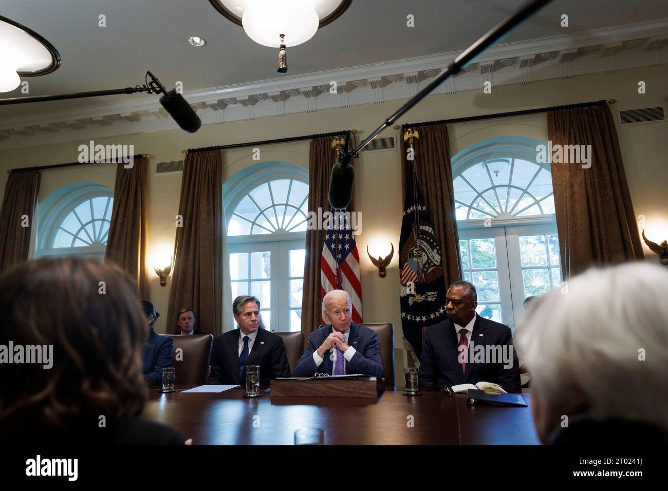 United States President Joe Biden speaks during a cabinet meeting at the White House in Washington, DC, US, on Monday, October 2, 2023. On Saturday, Congress passed a bipartisan measure that would keep the US government funded until Nov. 17 with $16 billion in disaster funding, however the lack of $6 billion in Ukraine aid is a blow to Biden. Looking on at left is US Secretary of State Antony Blinken and at right is US Secretary of Defense Lloyd J. Austin III. Credit: Ting Shen / Pool via CNP Stock Photo