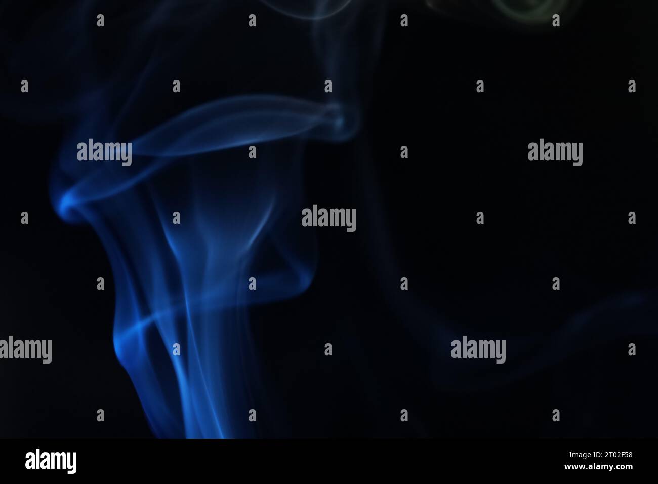 Blue smoke on a dark background, abstract photography Stock Photo - Alamy