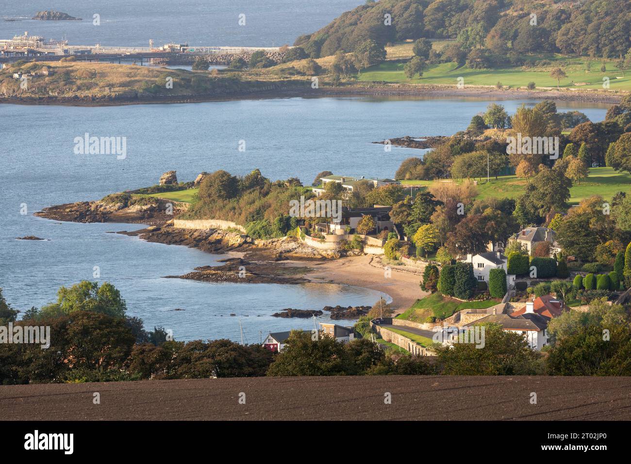 The picturesque village of Aberdour and black sands beach,Fife, Scotland Stock Photo