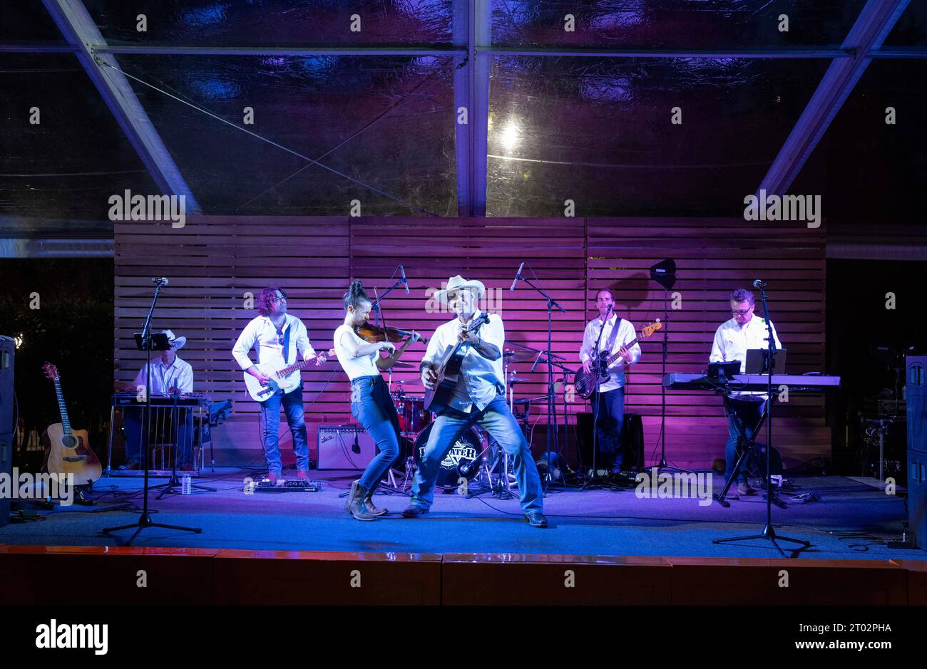 The country band Drywater of Houston performs during a 'tailgate party' hosted by Texas Gov. Greg Abbott the evening before a football game between undefeated Texas (4-0) and Kansas (4-0) in Austin on September 29, 2023. ©Bob Daemmrich Stock Photo