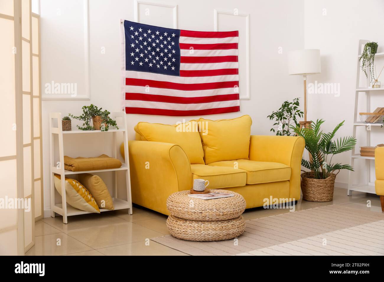 Interior of modern living room with hanging USA flag Stock Photo - Alamy