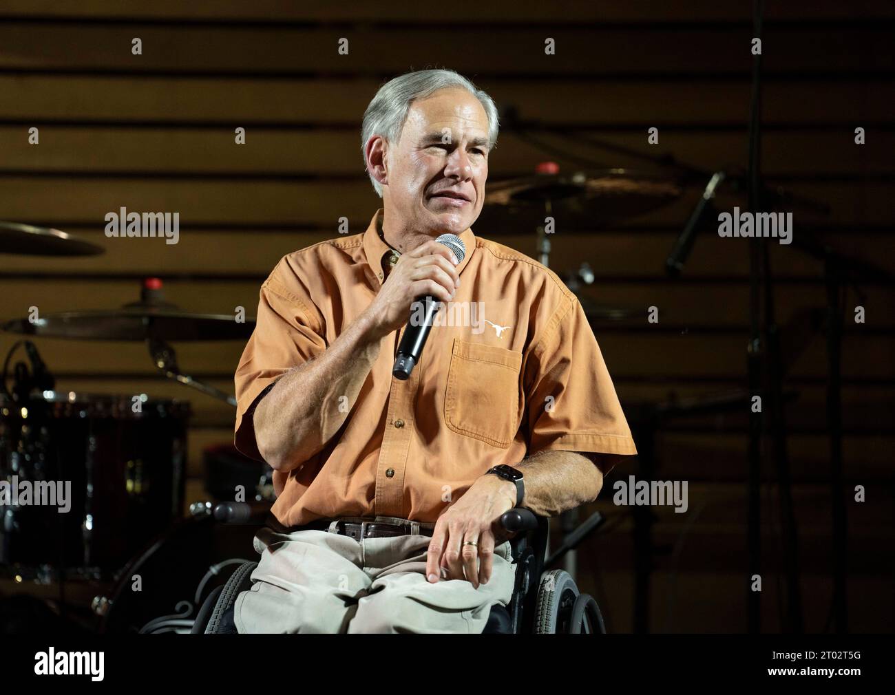 Texas Governor GREG ABBOTT speaks during a 'tailgate party' hosted by Abbott the evening before a football game between undefeated Texas (4-0) and Kansas (4-0) in Austin on September 29, 2023. Several hundred Longhorn fans roamed the grounds and toured the governor's mansion. ©Bob Daemmrich Stock Photo