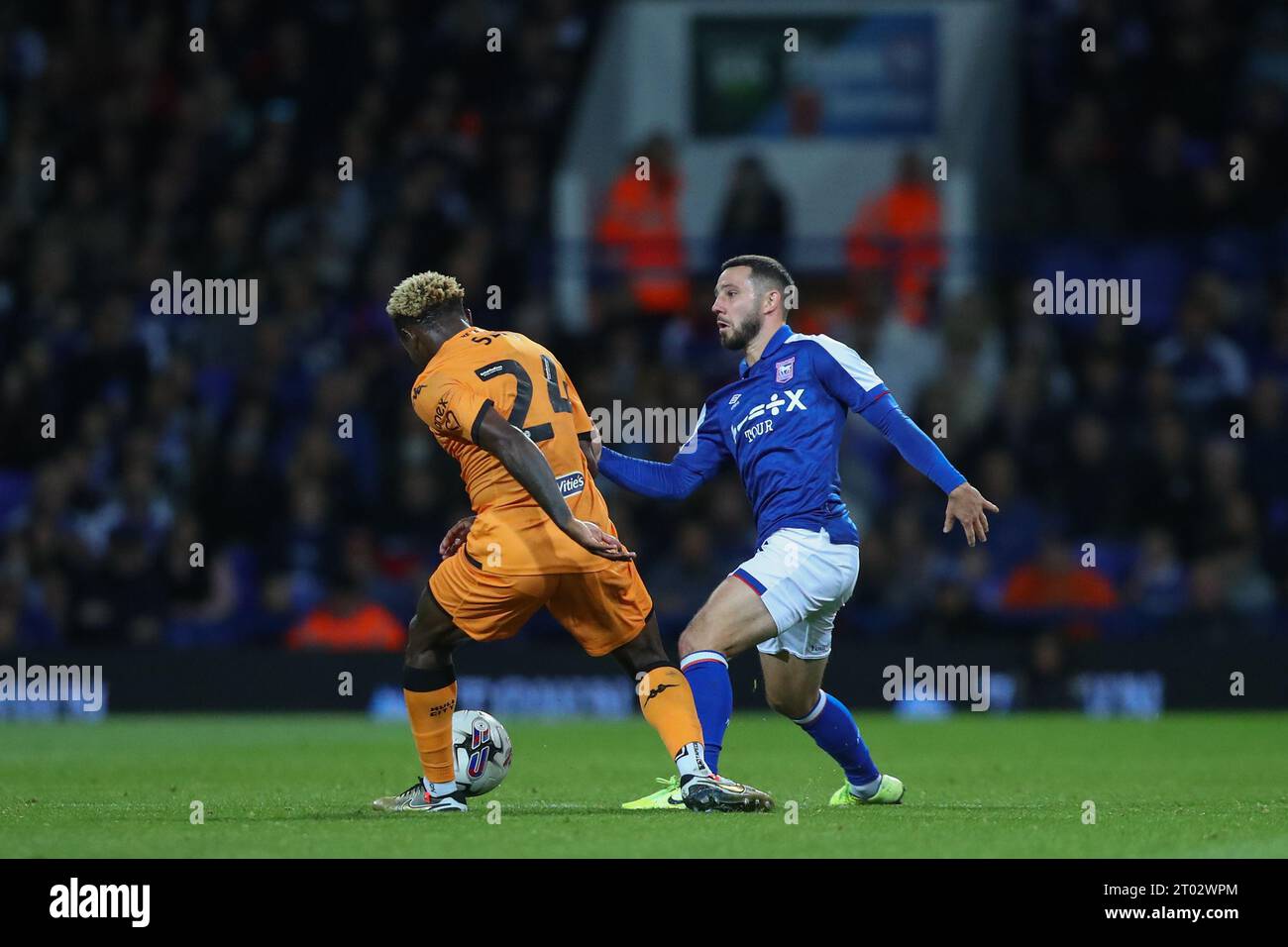 Jean Michaël Seri #24 of Hull City tackles Conor Chaplin #10 of Ipswich Town during the Sky Bet Championship match Ipswich Town vs Hull City at Portman Road, Ipswich, United Kingdom, 3rd October 2023  (Photo by Gareth Evans/News Images) Stock Photo