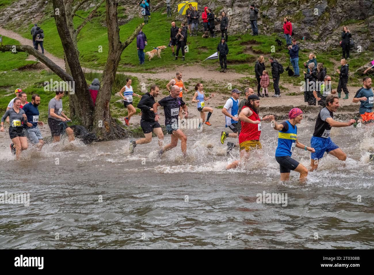 Competitors running in the Dovedale Dash a 4 3/4 mile cross country run starting from the Derbyshire village of Thorpe and into the Dovedale valley. Stock Photo