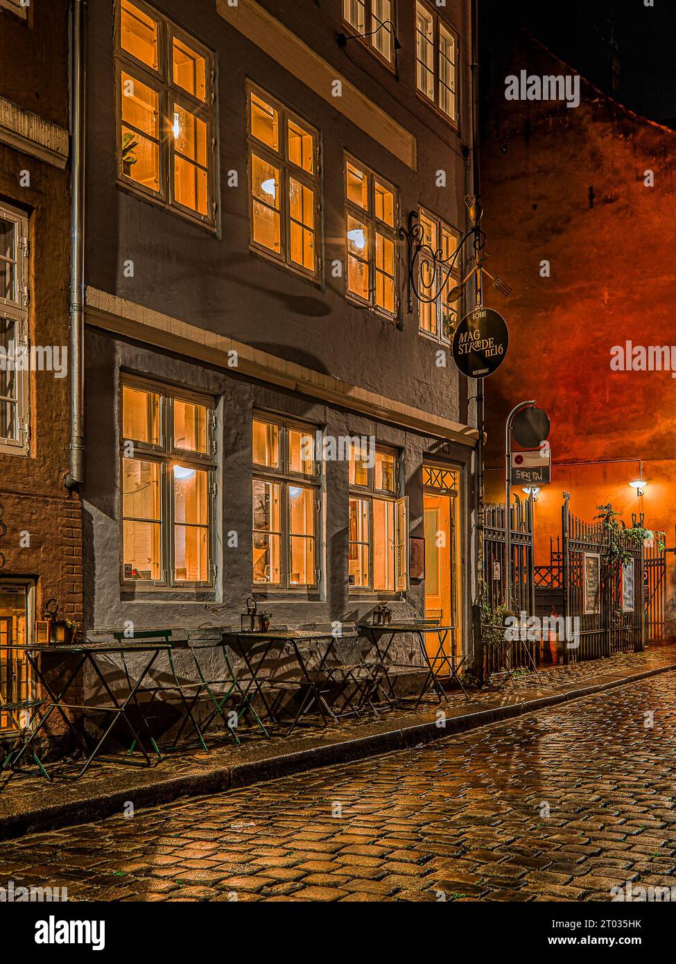 facade of a retro restaurant at night in the old town of Copenhagen, Magstraede 16, Oktober 2, 2023 Stock Photo