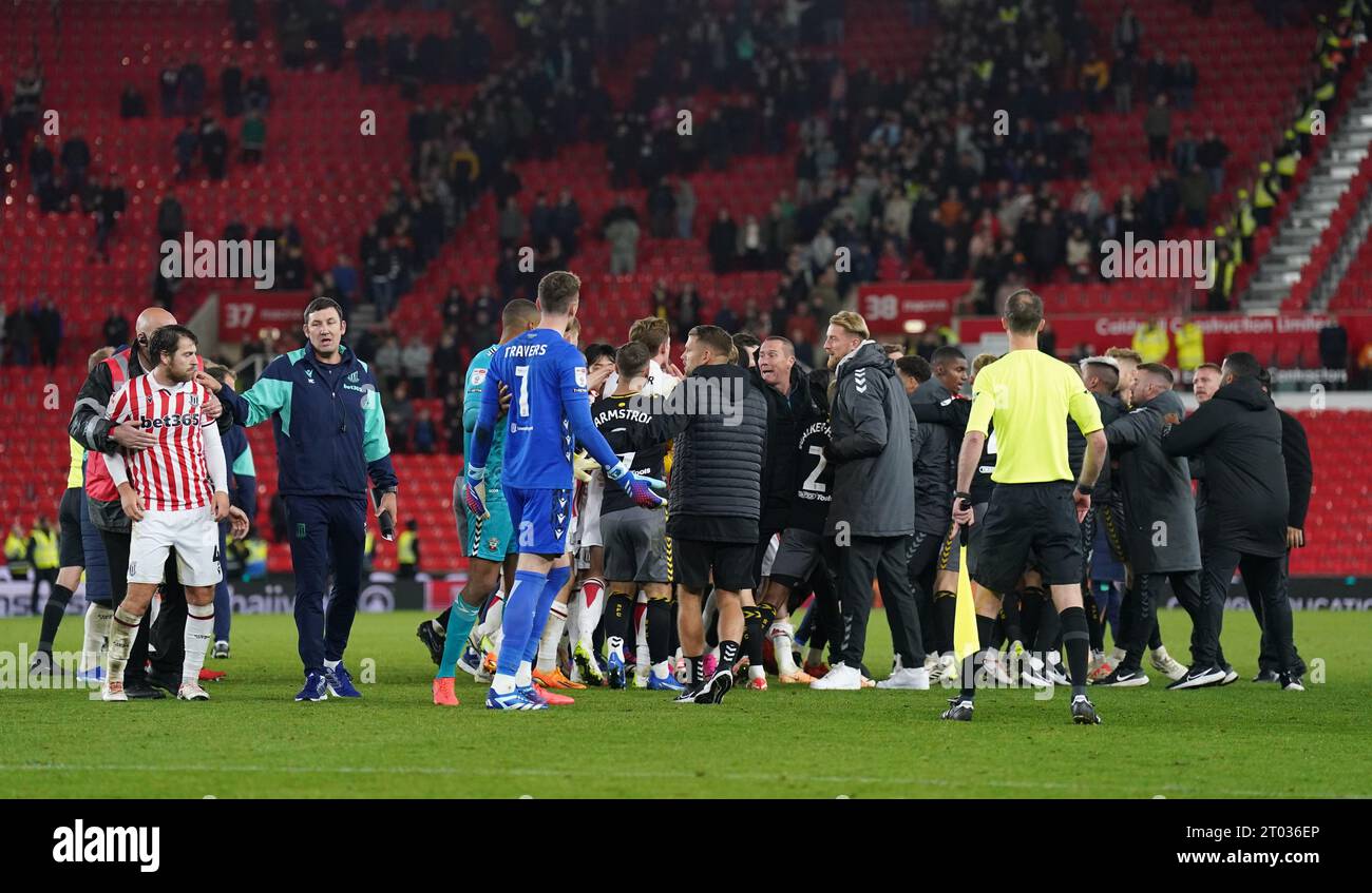 Players from both sides clash at full time during the Sky Bet Championship match at the bet365 Stadium, Stoke-on-Trent. Picture date: Tuesday October 3, 2023. Stock Photo