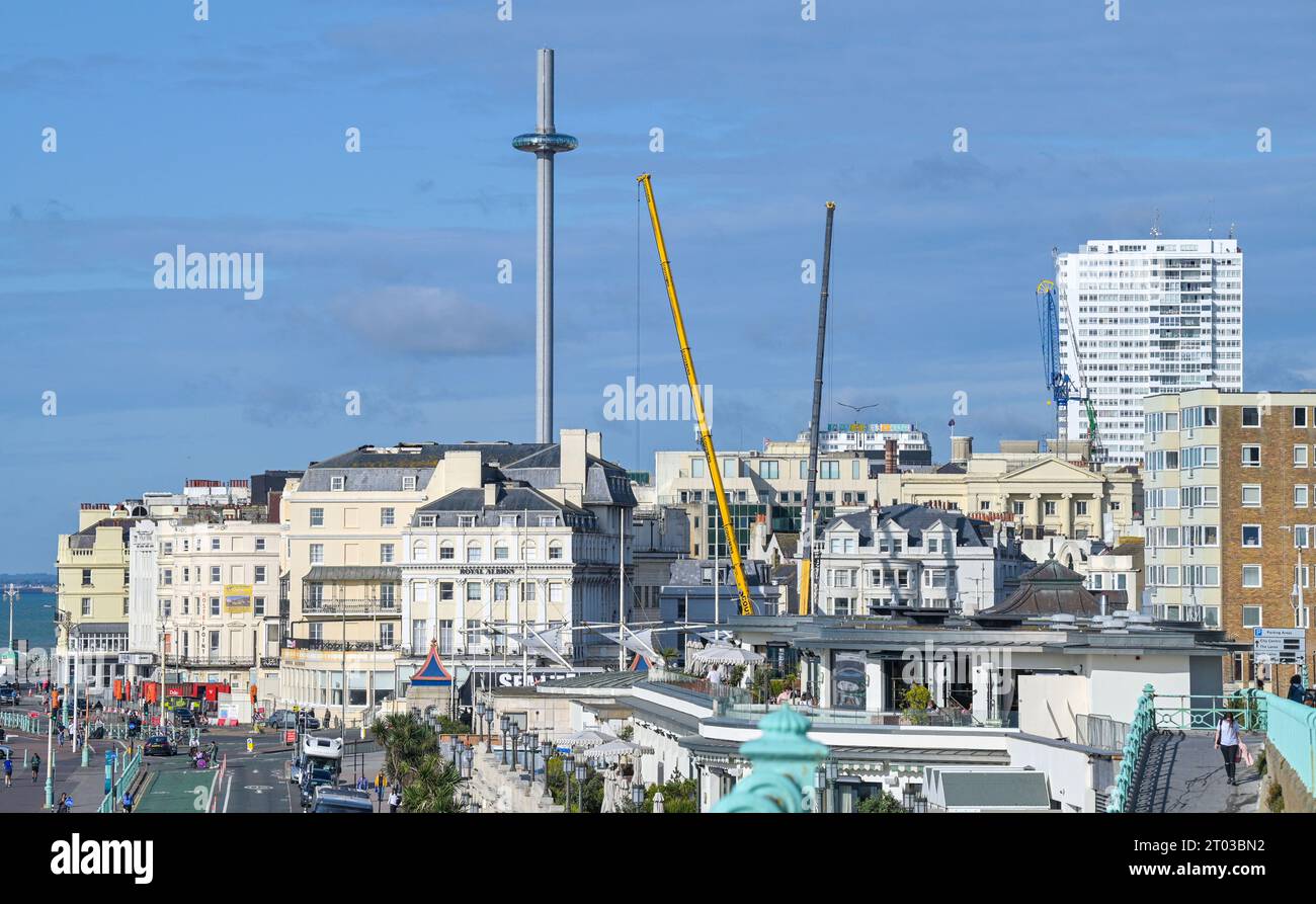 View of Brighton skyline with demolition work at the Royal Albion Hotel after a recent fire and the i360 behind   , Sussex , England UK Stock Photo