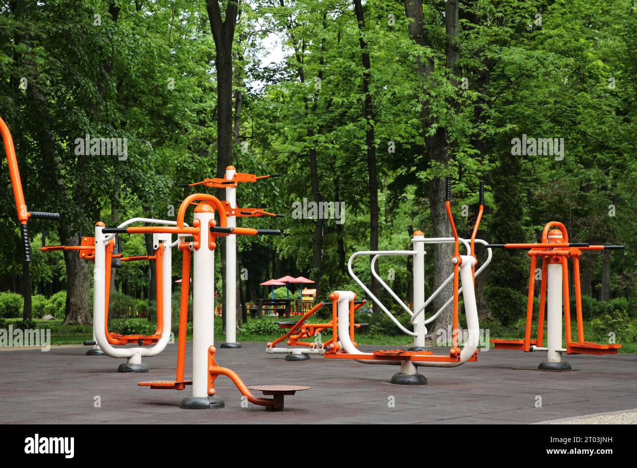 Empty outdoor gym with double abductor, twister, air walker and push up bars Stock Photo