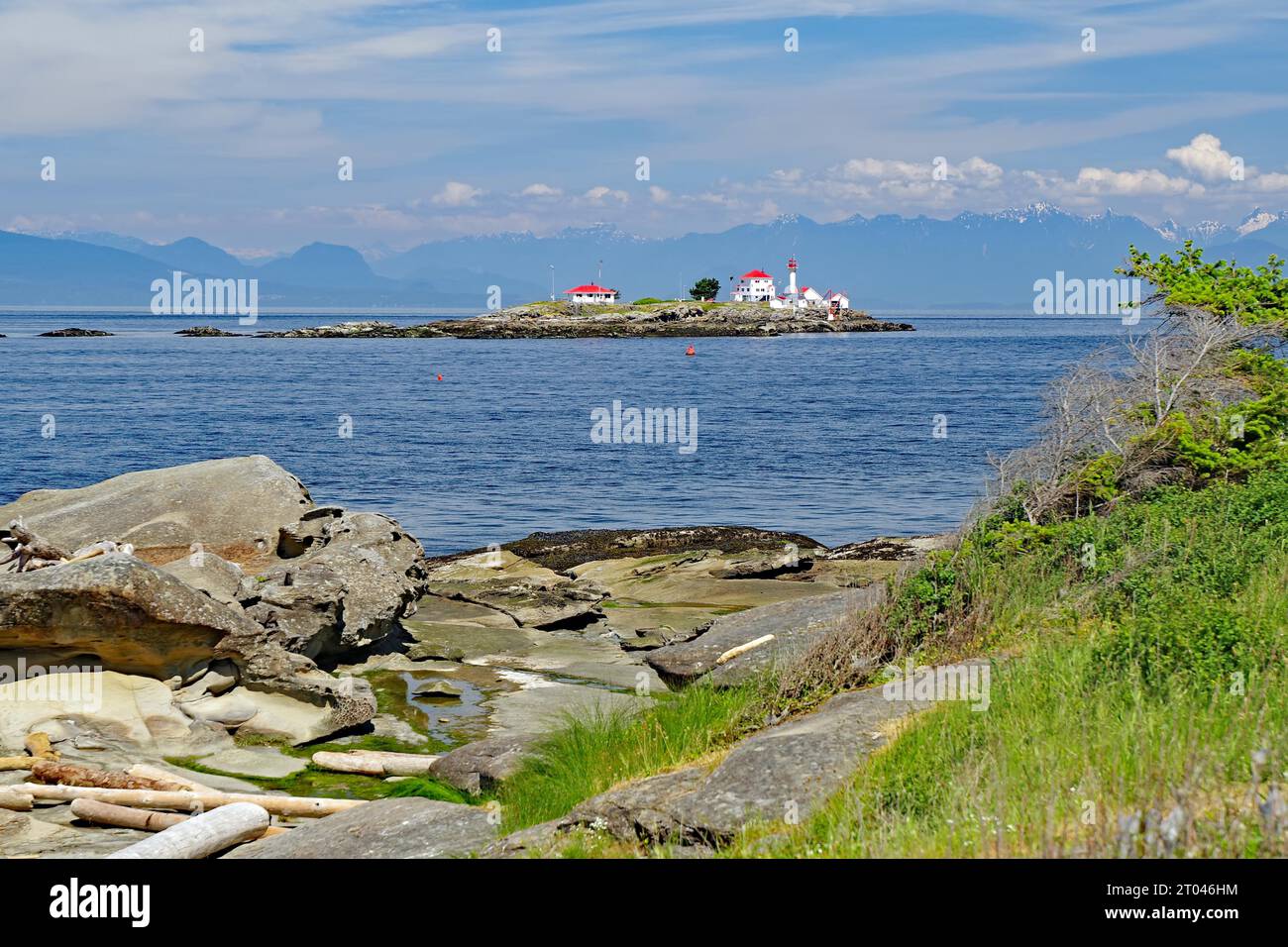 Beach and rocky bay with lighthouse, cosiness, longing, wanderlust, tourism, Gabriola Island, Gulf Islands, Vancouver Island, British Columbia, Canada Stock Photo