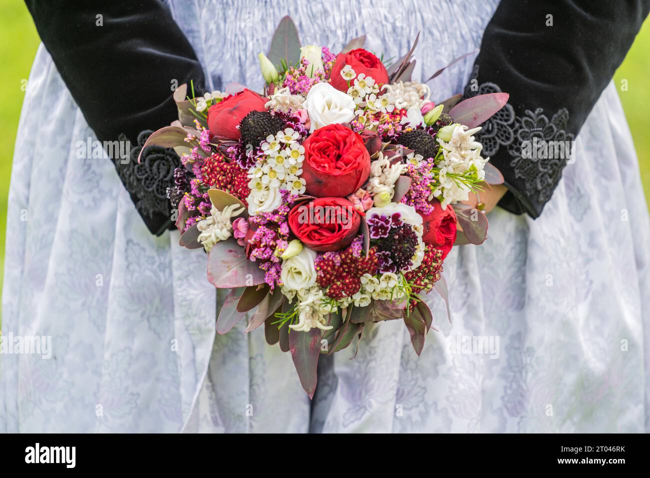 Bridal bouquet with traditional Zillertal traditional costume Stock Photo