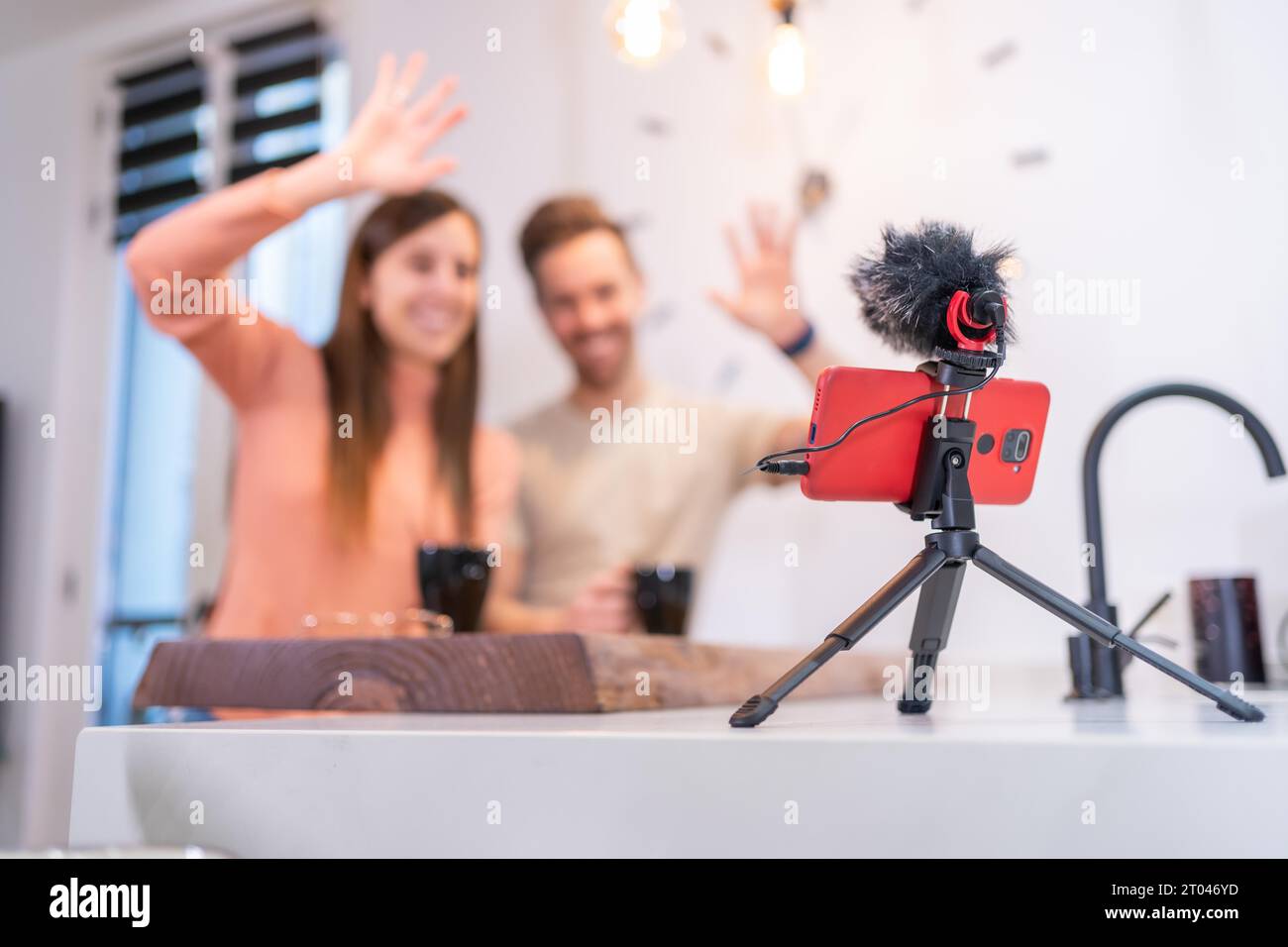 Famous internet influencer filming agenda review while at home in studio.  Popular social media star doing notebook recommendation video while  presenting product to audience Stock Photo - Alamy