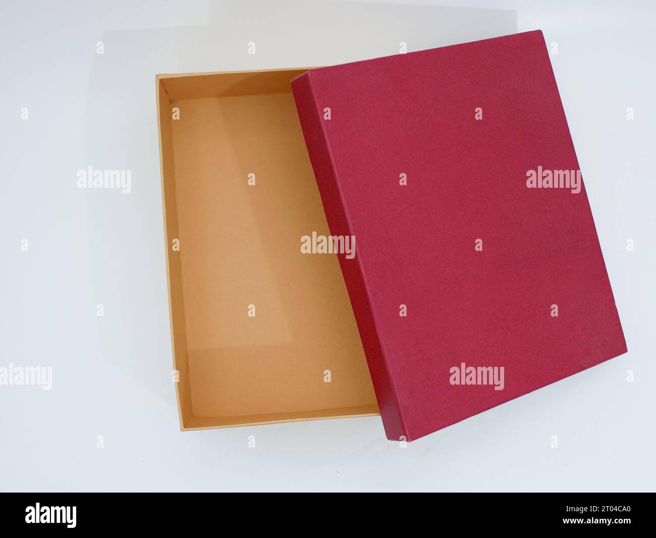 red and brown open gift box isolated on white Stock Photo
