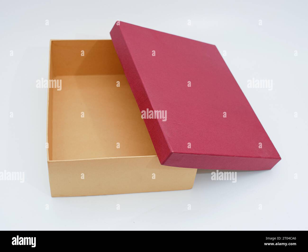 red and brown open gift box isolated on white Stock Photo