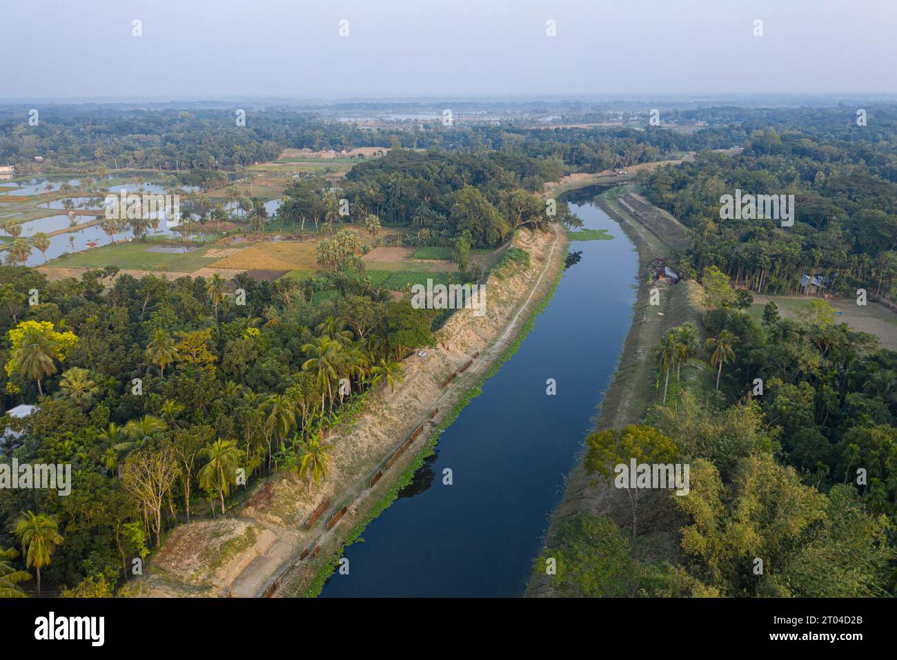 A dried-up canal at Keshabpur in Jashore returns to life after re-excavation works, aerial view of rural Bangladesh. Stock Photo