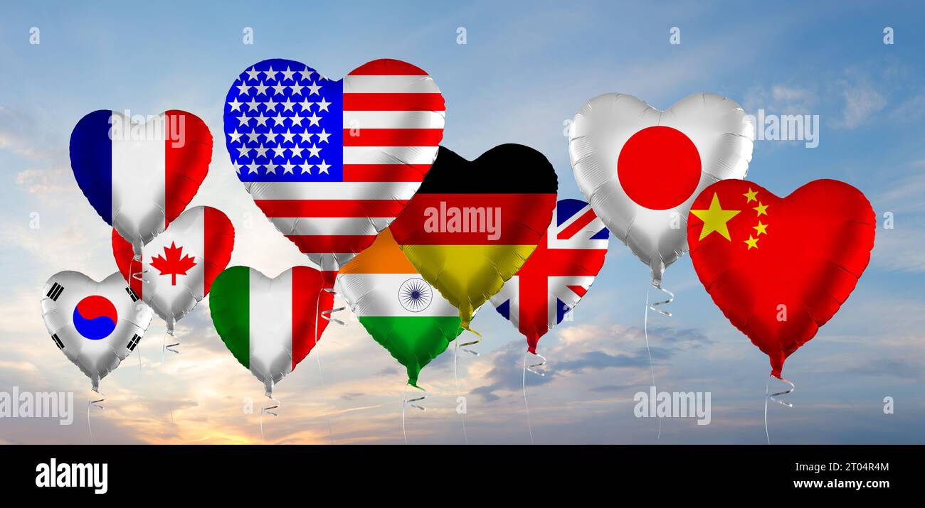 Flag of different countries against blue sky. The Biggest Economies in