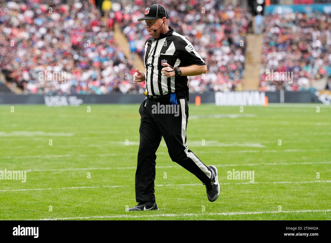 NFL line judge Tripp Sutter (37) walks the field during an NFL football  game between the Dallas Cowboys and New York Giants on Sunday, Sept. 10,  2023, in East Rutherford, N.J. (AP