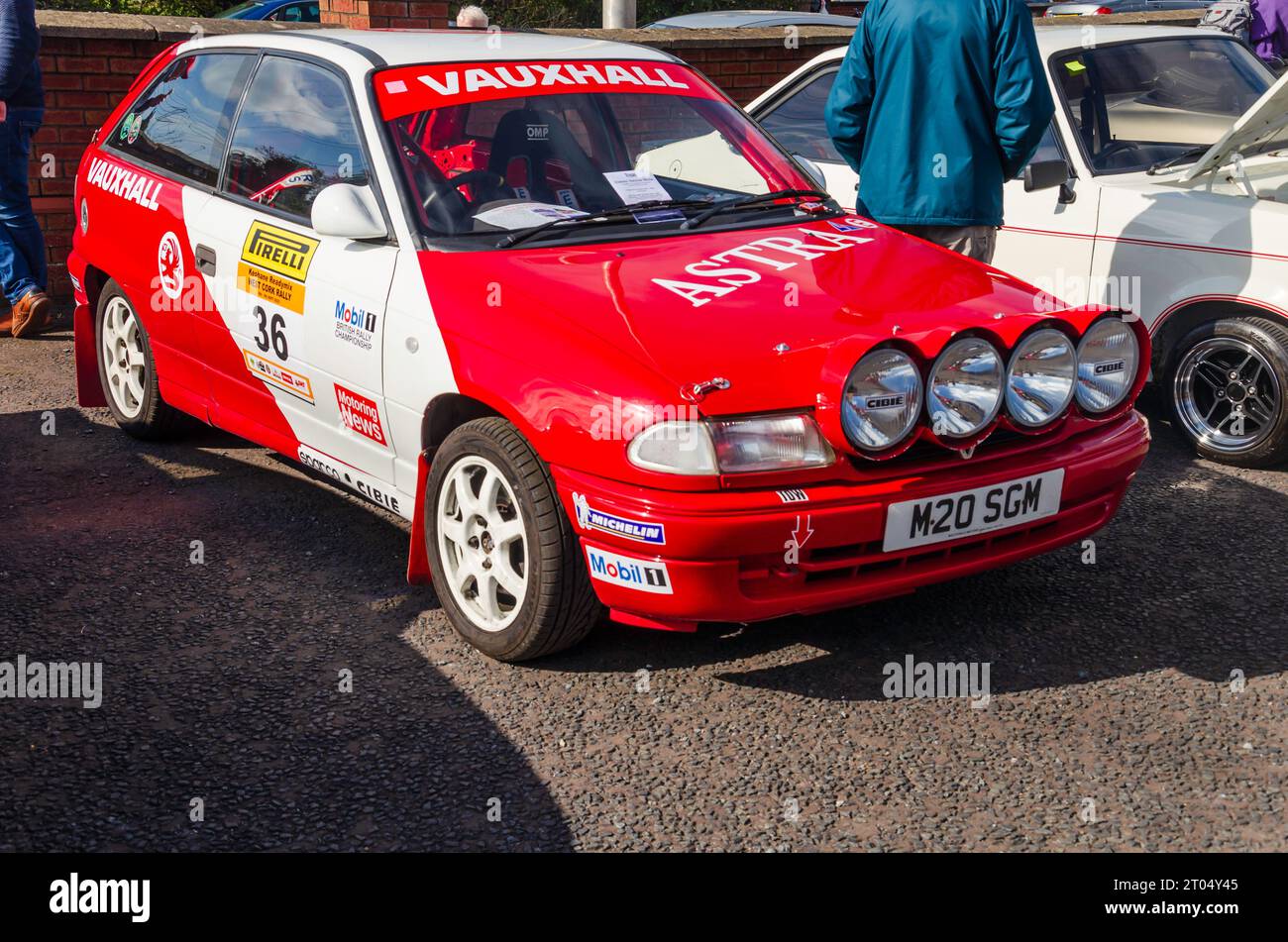 Carryduff, County Down, Northern Ireland September 23 2023 - Red Vauxhall Astra rally car with 4 spots and various decal. Stock Photo