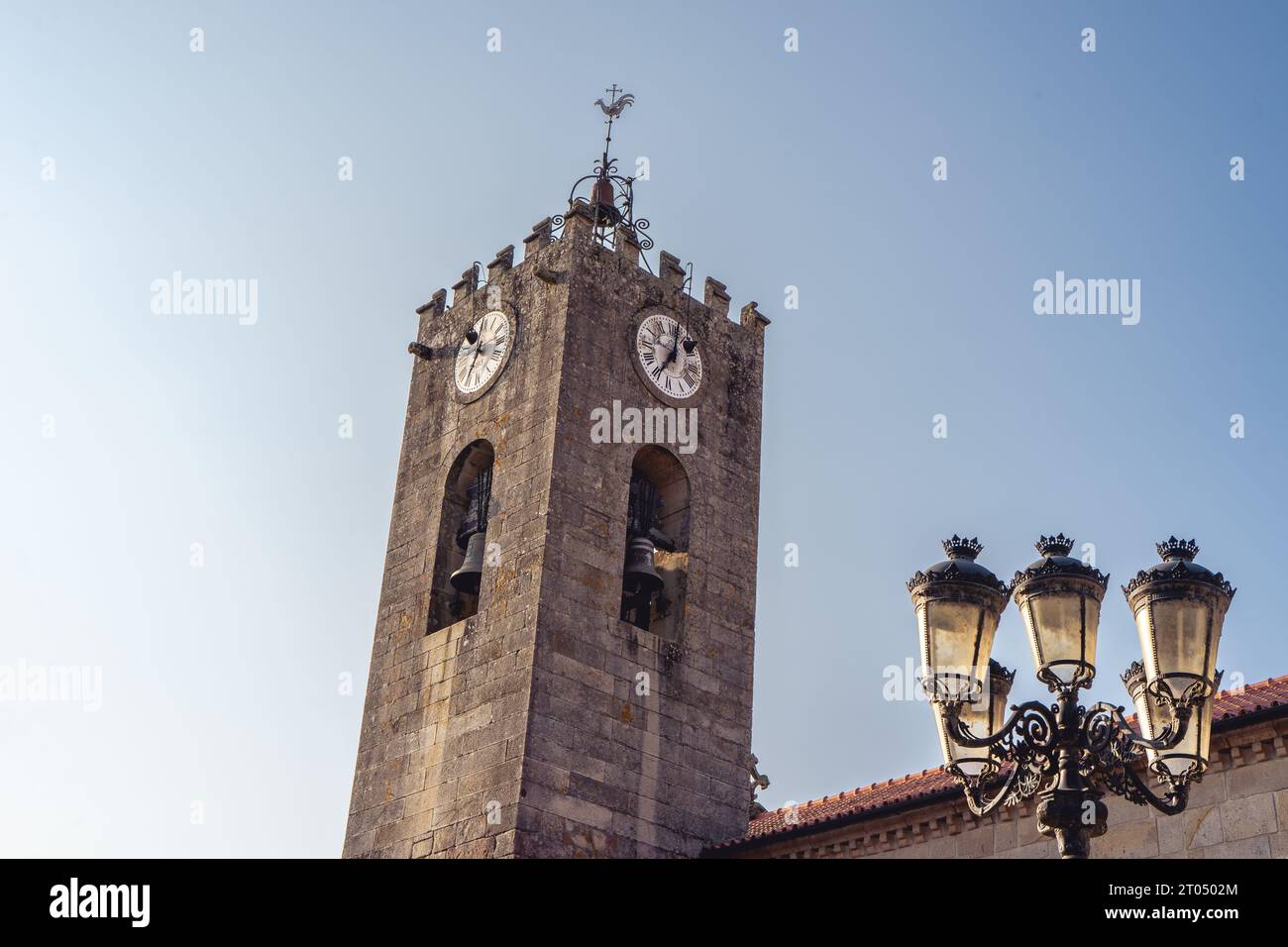 Old church and streetlight, in the Center of Ponte de Lima, Portugal. Stock Photo